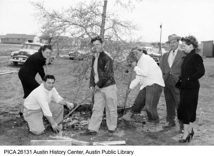 Photograph of a group of 3 women and 3 men posing next to a tree that had just been planted at Brentwood Elementary School.