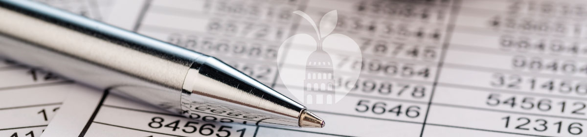 Image of accounting paperwork and pen with Austin ISD appitol