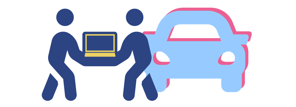 two people transferring a laptop by a car