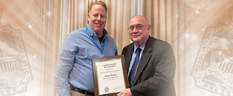 Reeves holding award