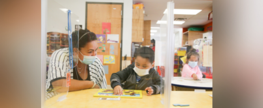 A teacher teaching a student