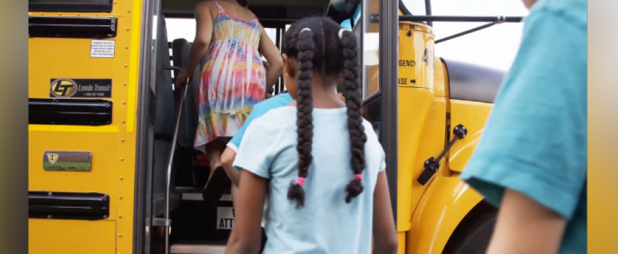 Students boarding a bus