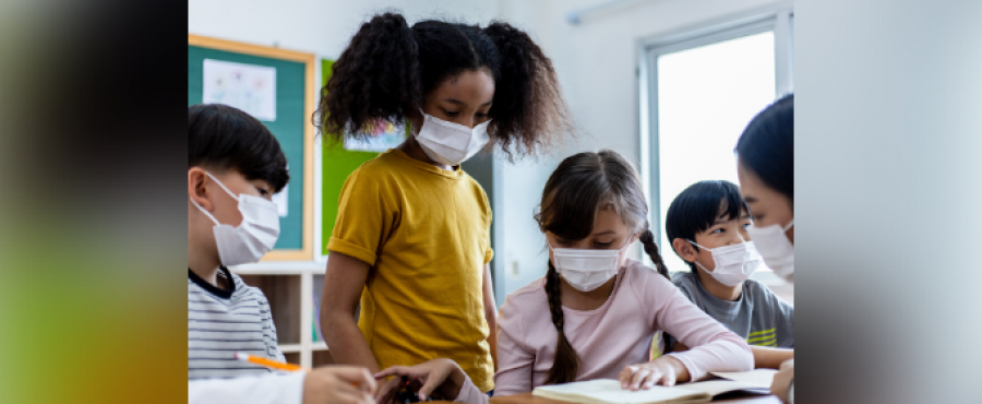 Students studying in masks