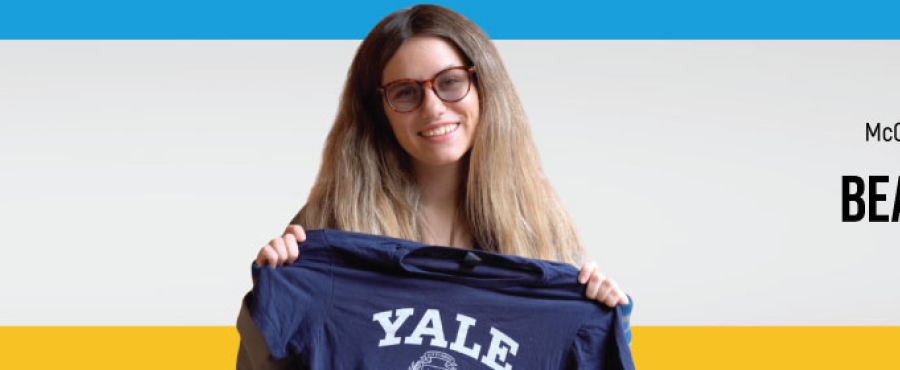 Beatrix holding a Yale University flag for Senior Success Story
