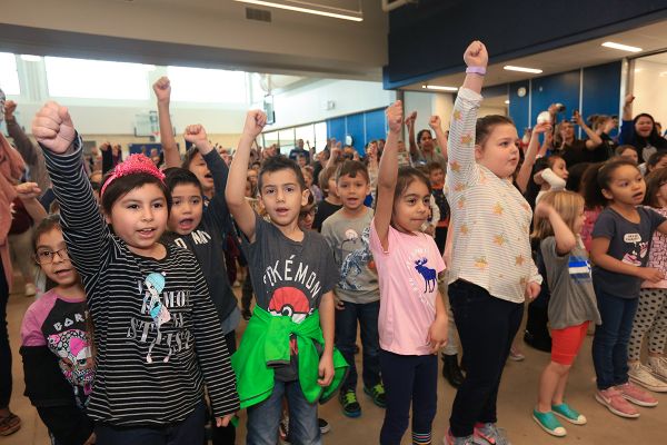 Students raising hands