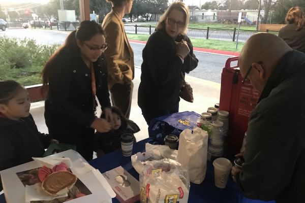 Staff hands out coffee