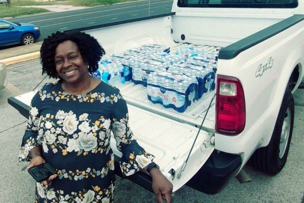 Water donation from Norman & Sims volunteer