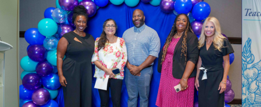 banner with teacher of the year winner